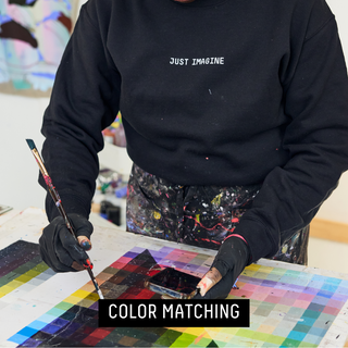 color matching - Artist Mekia Machine using her color chart to color match